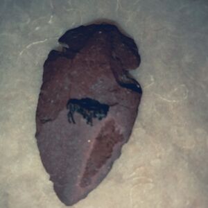 Unique Arrowhead with Bison Image - Rustic Stone Artifact